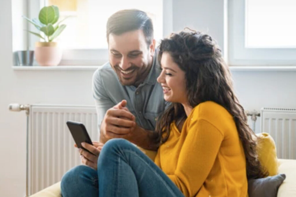 EmpathyMe Couple looking at phone together